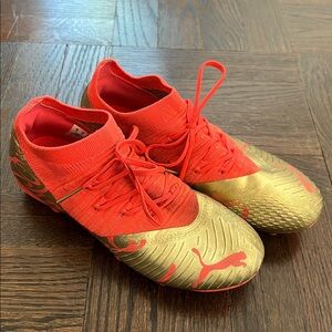 Puma Kids soccer cleats in Red and Gold